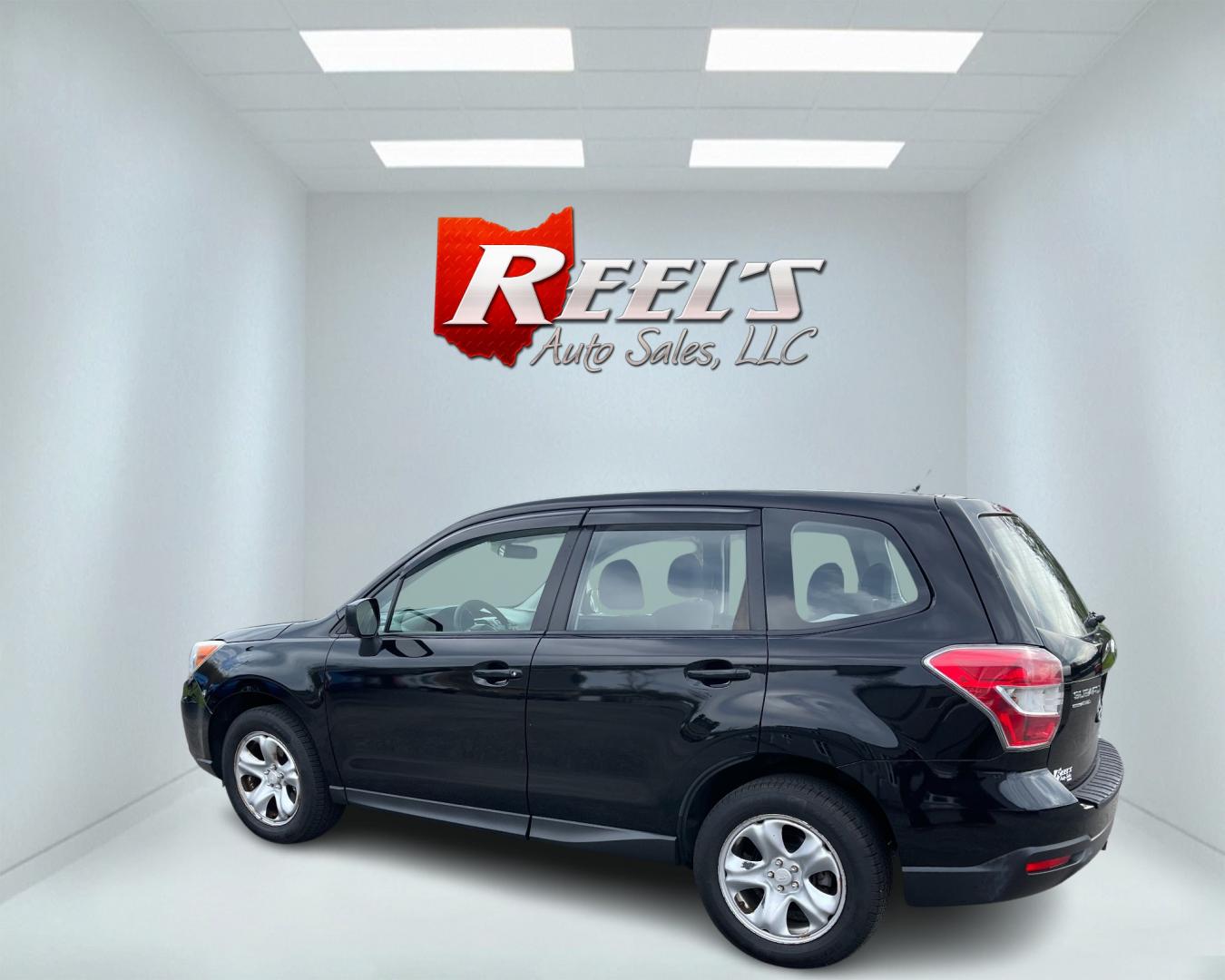 2015 Black /Black Subaru Forester 2.5i (JF2SJAAC1FH) with an 2.5L H4 SOHC 16V engine, Automatic transmission, located at 11115 Chardon Rd. , Chardon, OH, 44024, (440) 214-9705, 41.580246, -81.241943 - Photo#8